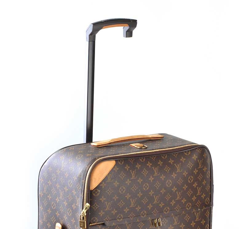 Sold at Auction: VINTAGE PRE-OWNED LOUIS VUITTON TRAVEL BAG