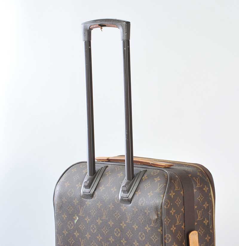 LOUIS VUITTON Pegase 60 Suitcase - MyDesignerly