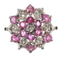 9CT GOLD RUBY AND DIAMOND PIERCED CLUSTER RING at Ross's Online Art Auctions