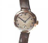 LADY'S 9CT GOLD ROLEX WATCH ON BROWN LEATHER STRAP at Ross's Online Art Auctions