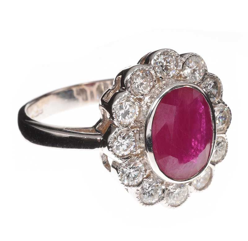 18CT WHITE GOLD RUBY AND DIAMOND CLUSTER RING