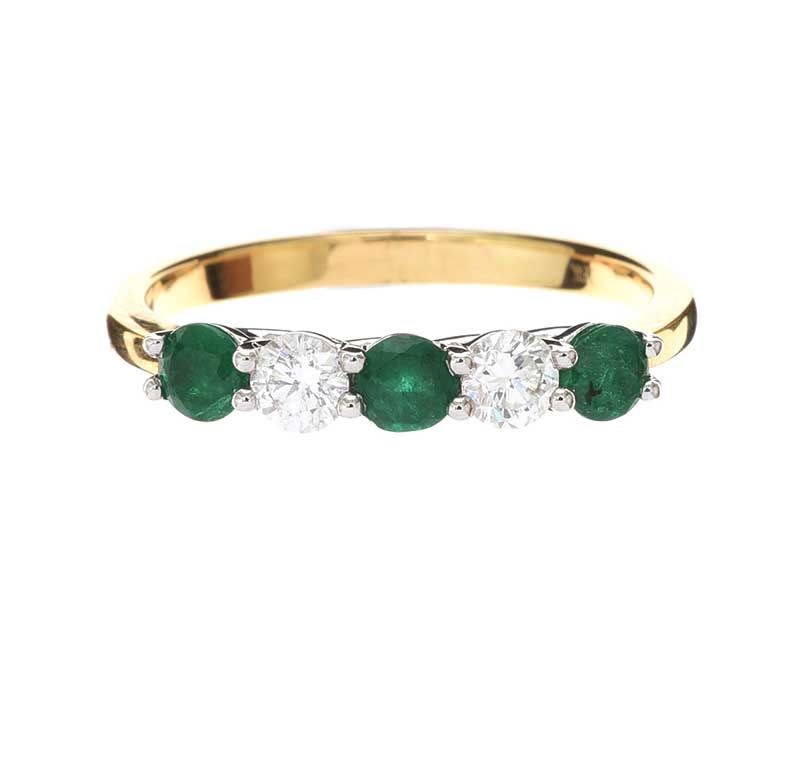 18CT GOLD EMERALD AND DIAMOND RING
