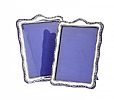 PAIR OF SILVER PHOTO FRAMES at Ross's Online Art Auctions